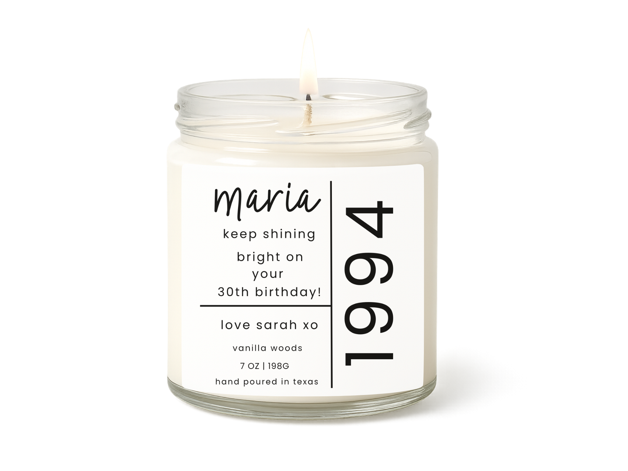 Candle in a glass jar with a personalized label on a white background