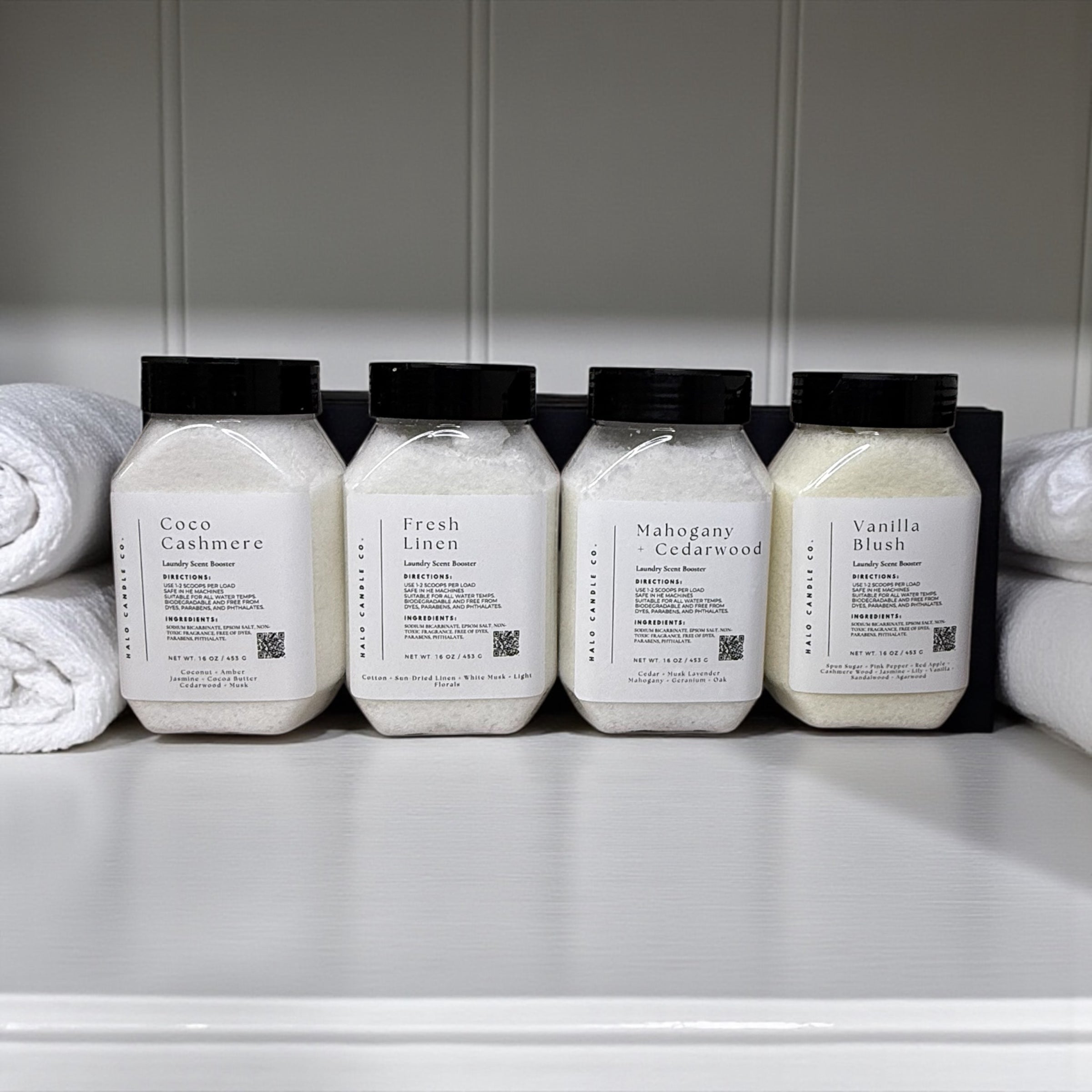 Laundry scent booster collection bottles in multiple fragrances on shelf